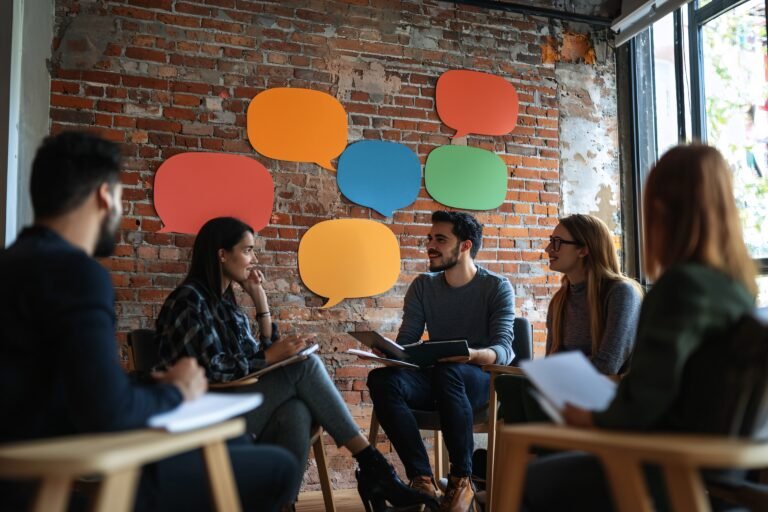 A vibrant meeting space buzzes with diverse speech bubbles, symbolizing the energy of collaborative discussions.