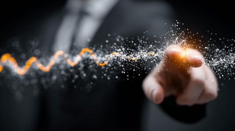 Businessman's finger pointing with glowing particles, representing innovation, technology, and futuristic concepts in business